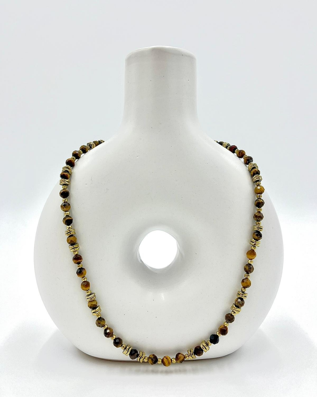 collier oeil de tigre protection hématite ancrage